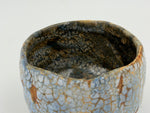 Pale blue chawan with an ochre mosaic — Interior view, 6.