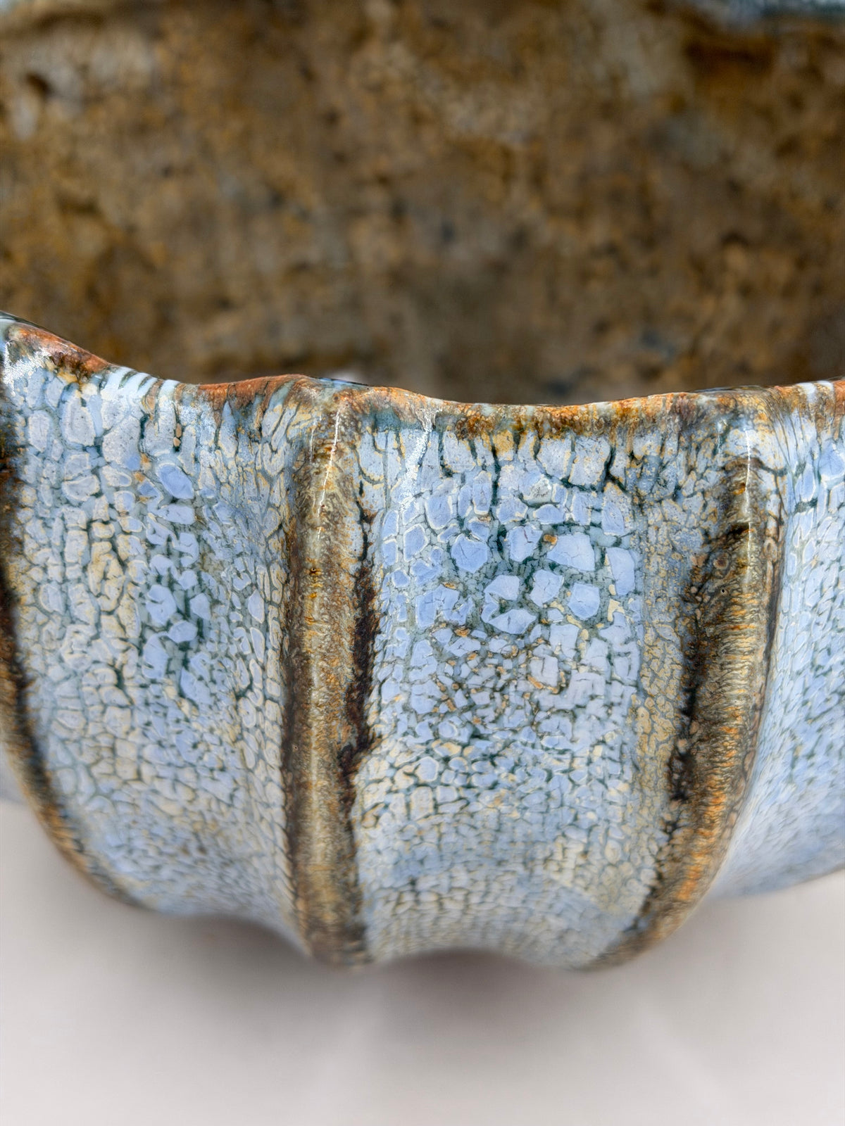 Ribbed bowl — pale blue with a brown interior — Detail of the glaze, 5.