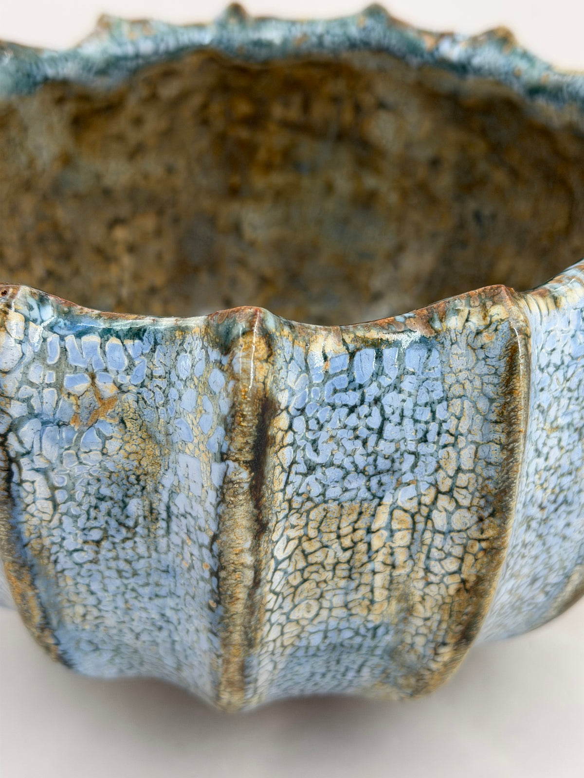 Ribbed bowl — pale blue with a brown interior — Detail of the glaze, 8.