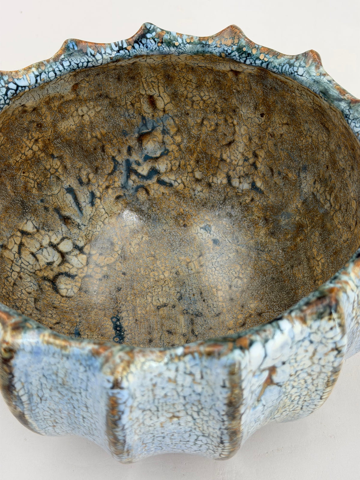 Ribbed bowl — pale blue with a brown interior — Detail of the glaze, 7.