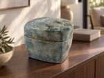 AI-generated setting : Blue grey box with an ochre network, on a walnut console.