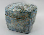 Blue grey box with an ochre network — Full view, 1.