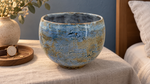 AI-generated setting : Bowl — pale blue with an ochre network, scene 1.